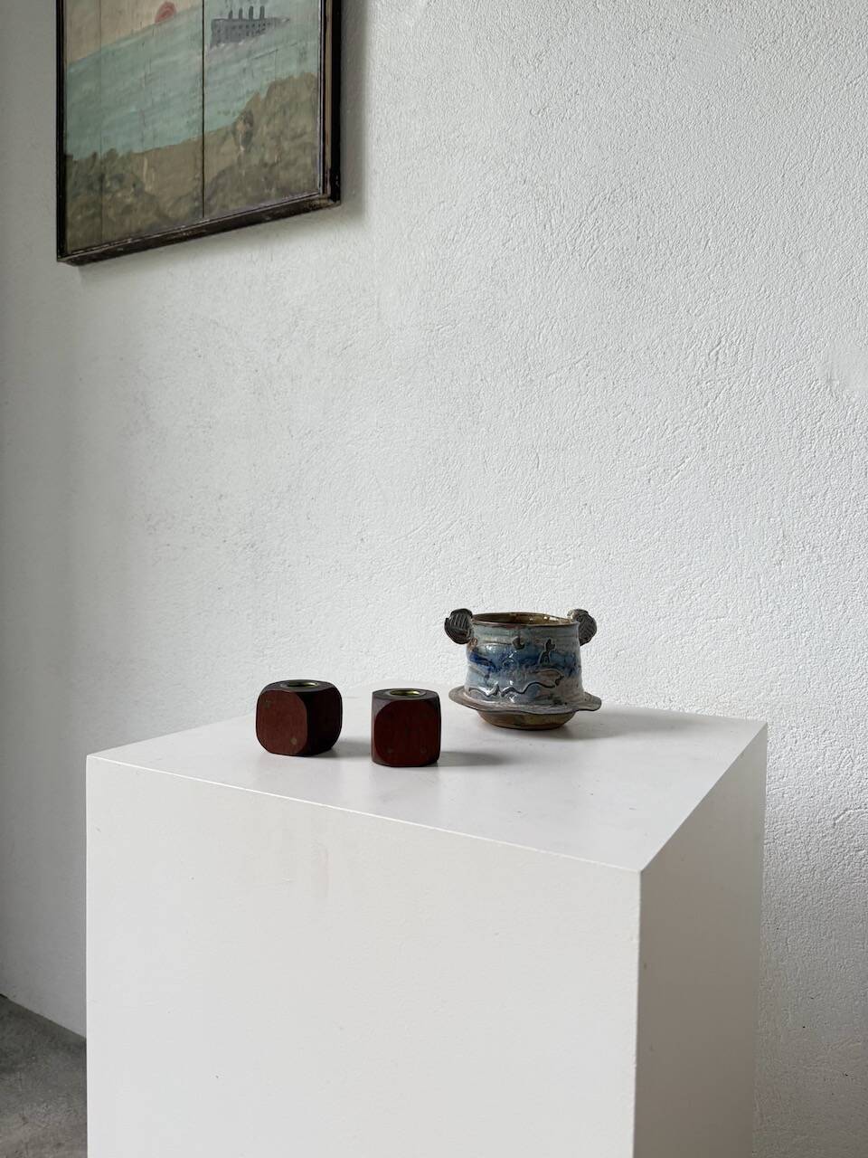 Pair of 1960s teak and brass "dice" candlesticks