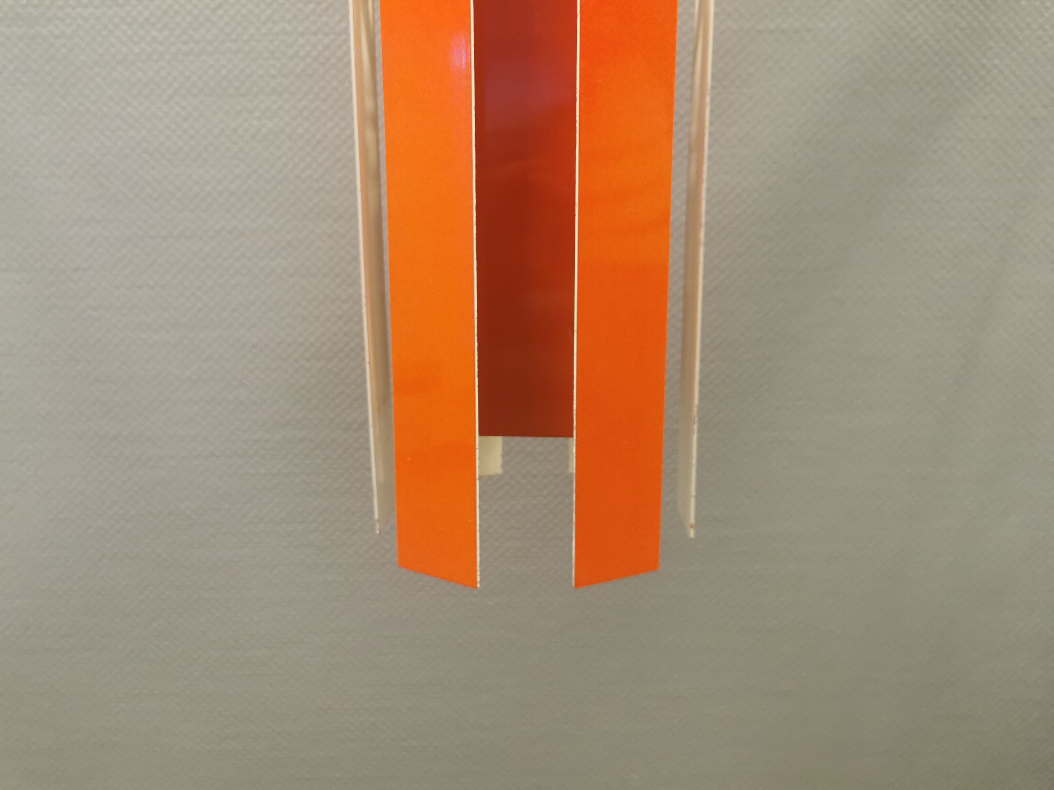 Danish hanging lamp model "Cocktail" consisting of 12 red/white aluminium slats