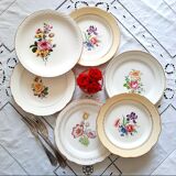 Flat earthenware plates with gilded edges