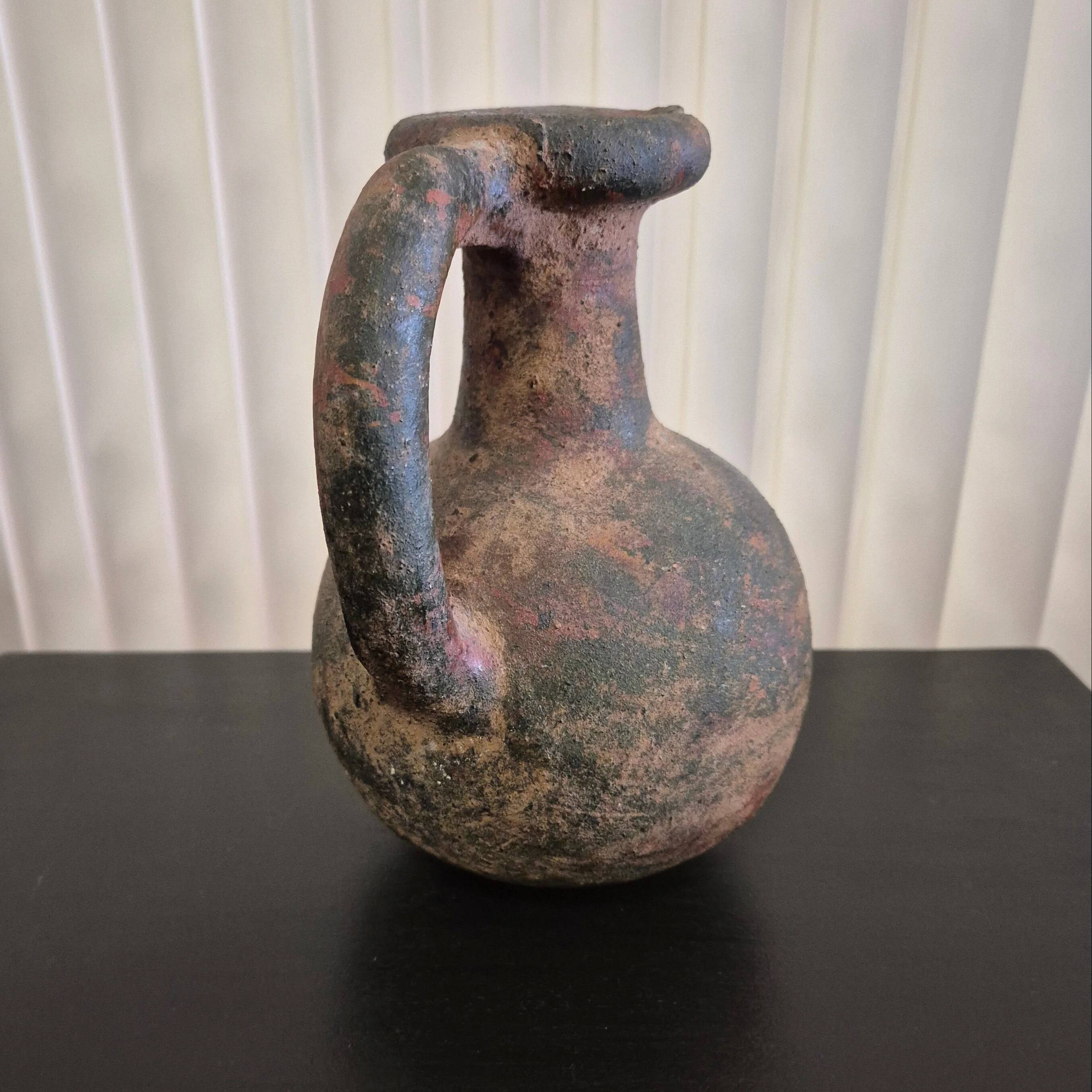 Ancient terracotta jug