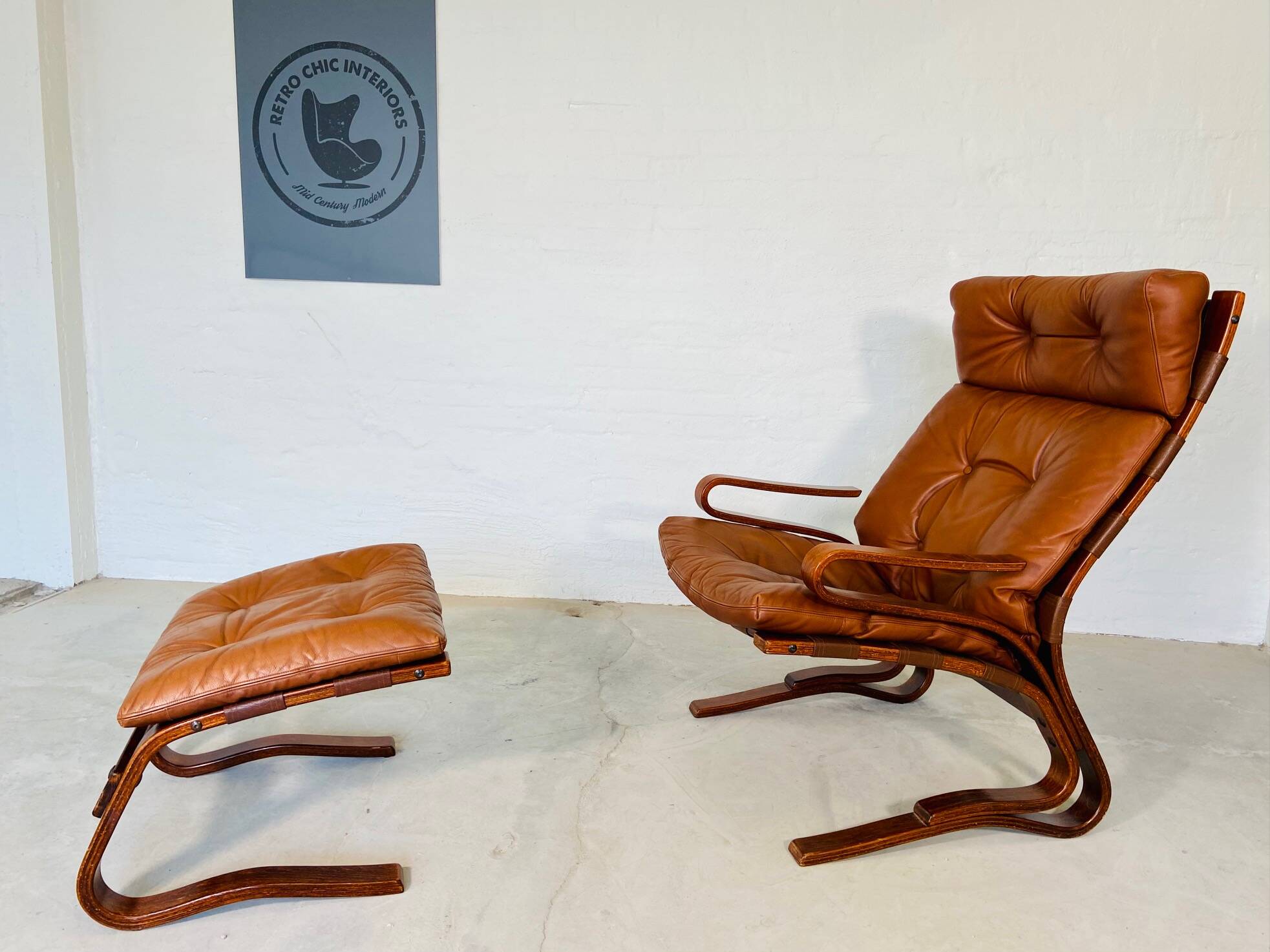 Vintage scandinavian cognac lounge chair by oddvin rykken 1960s