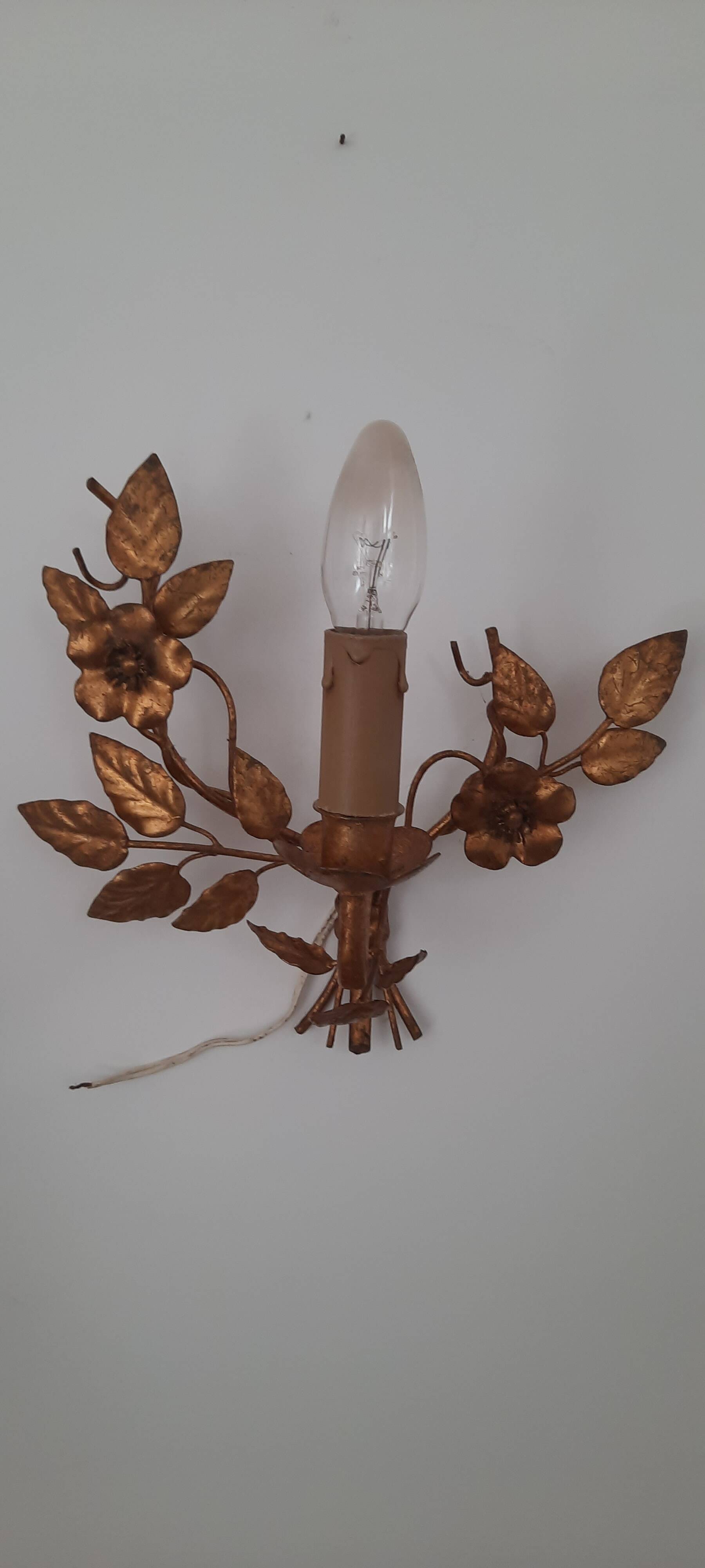 Gold metal wall light