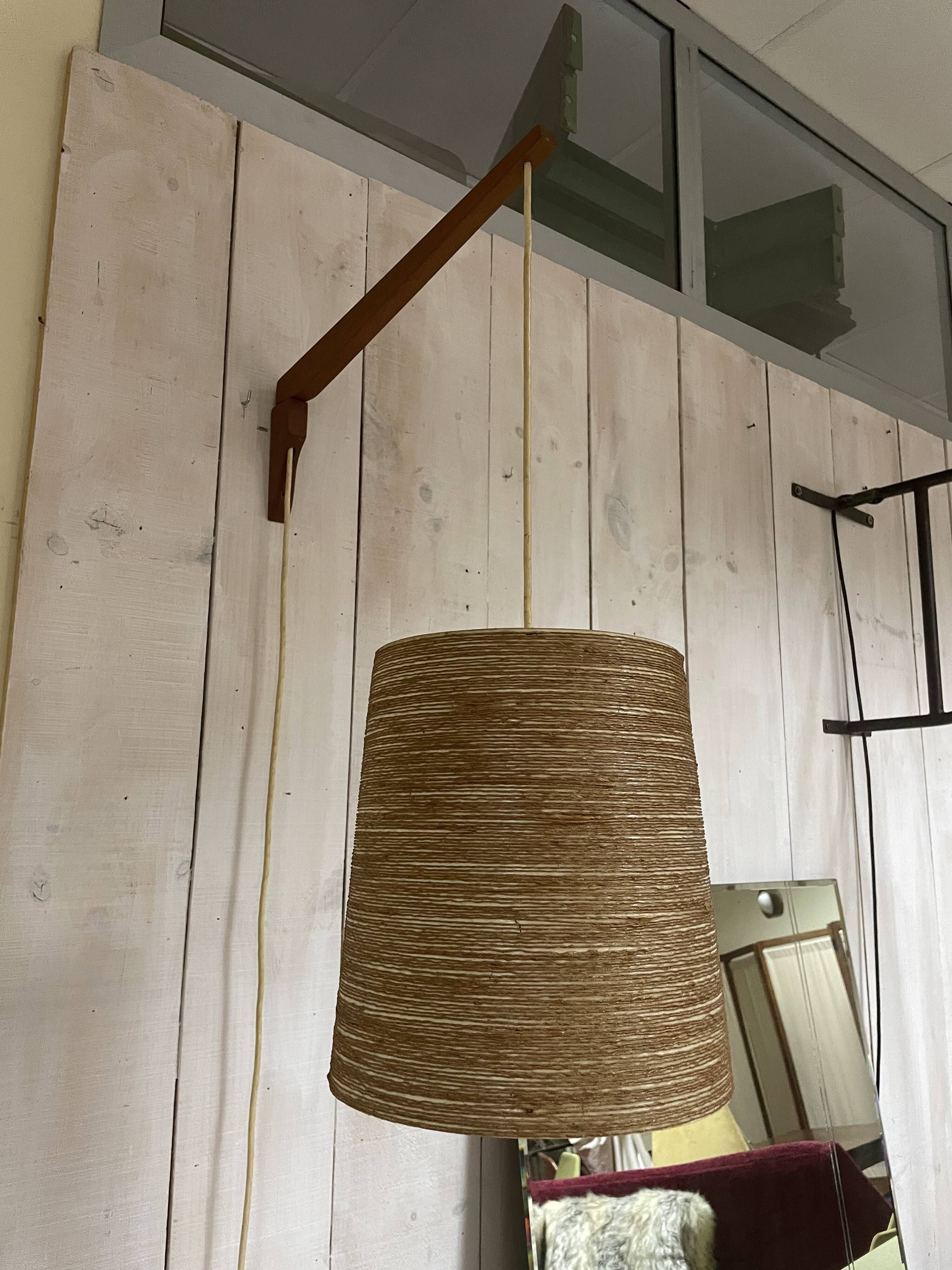 Rare teak and sisal wall lamp from the 1960s, attributed to Lotte Bostlund.