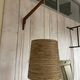 Rare teak and sisal wall lamp from the 1960s, attributed to Lotte Bostlund.