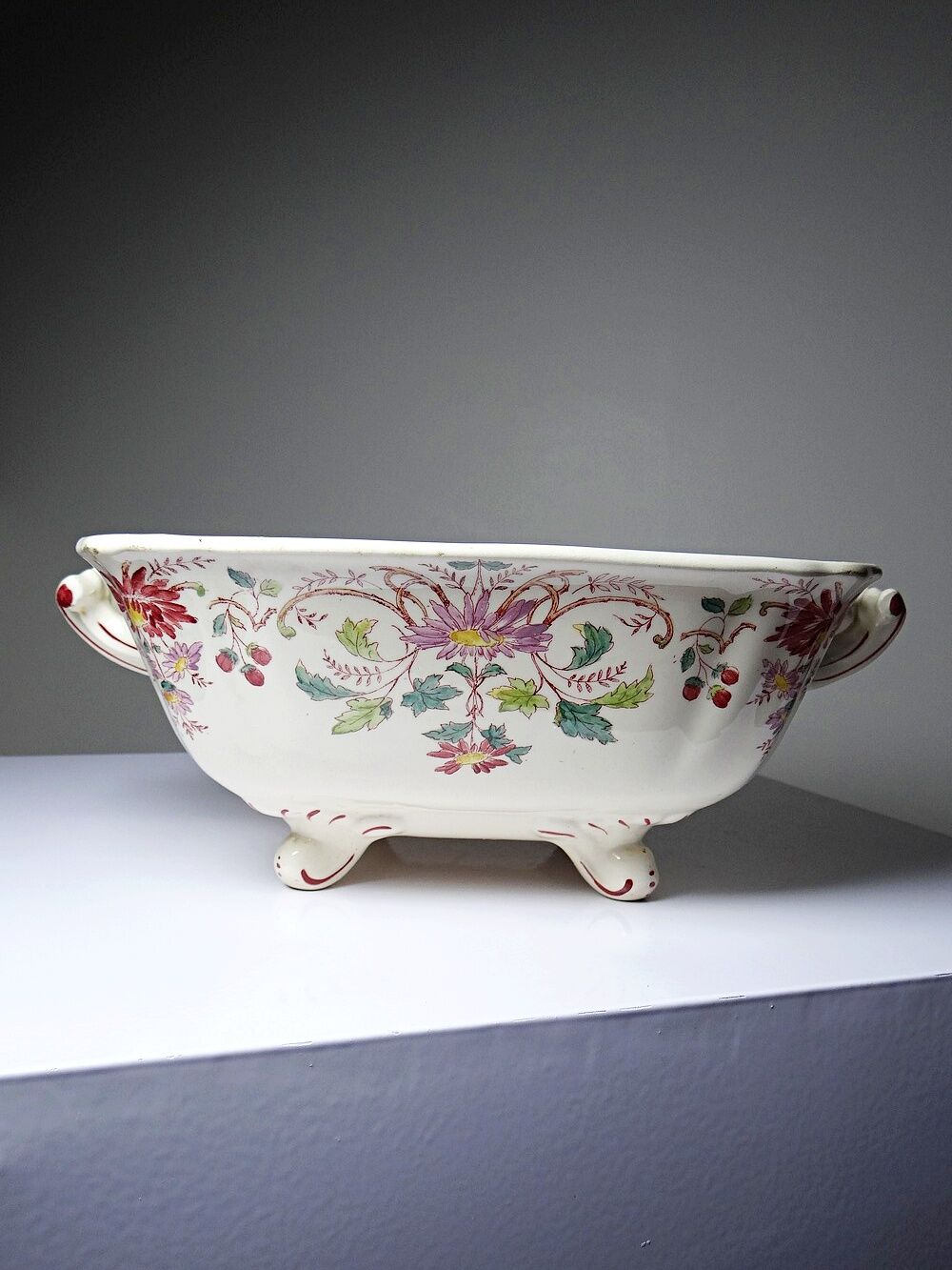Antique Longchamp soup tureen/vegetable dish with polychrome daisies in ironstone.