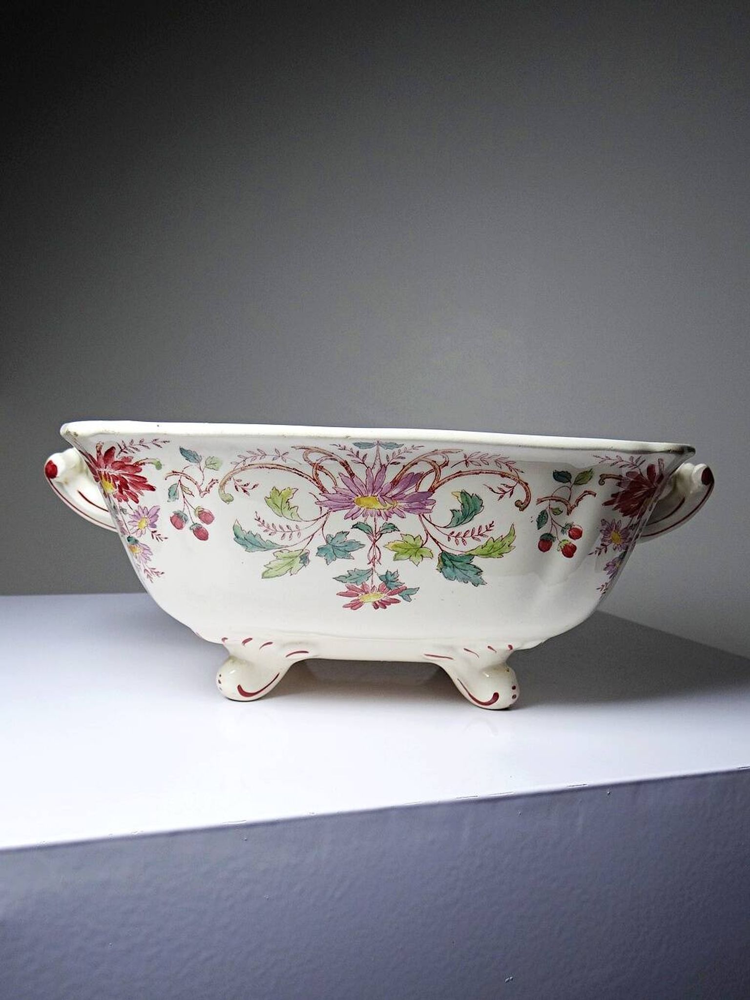 Antique Longchamp soup tureen/vegetable dish with polychrome daisies in ironstone.