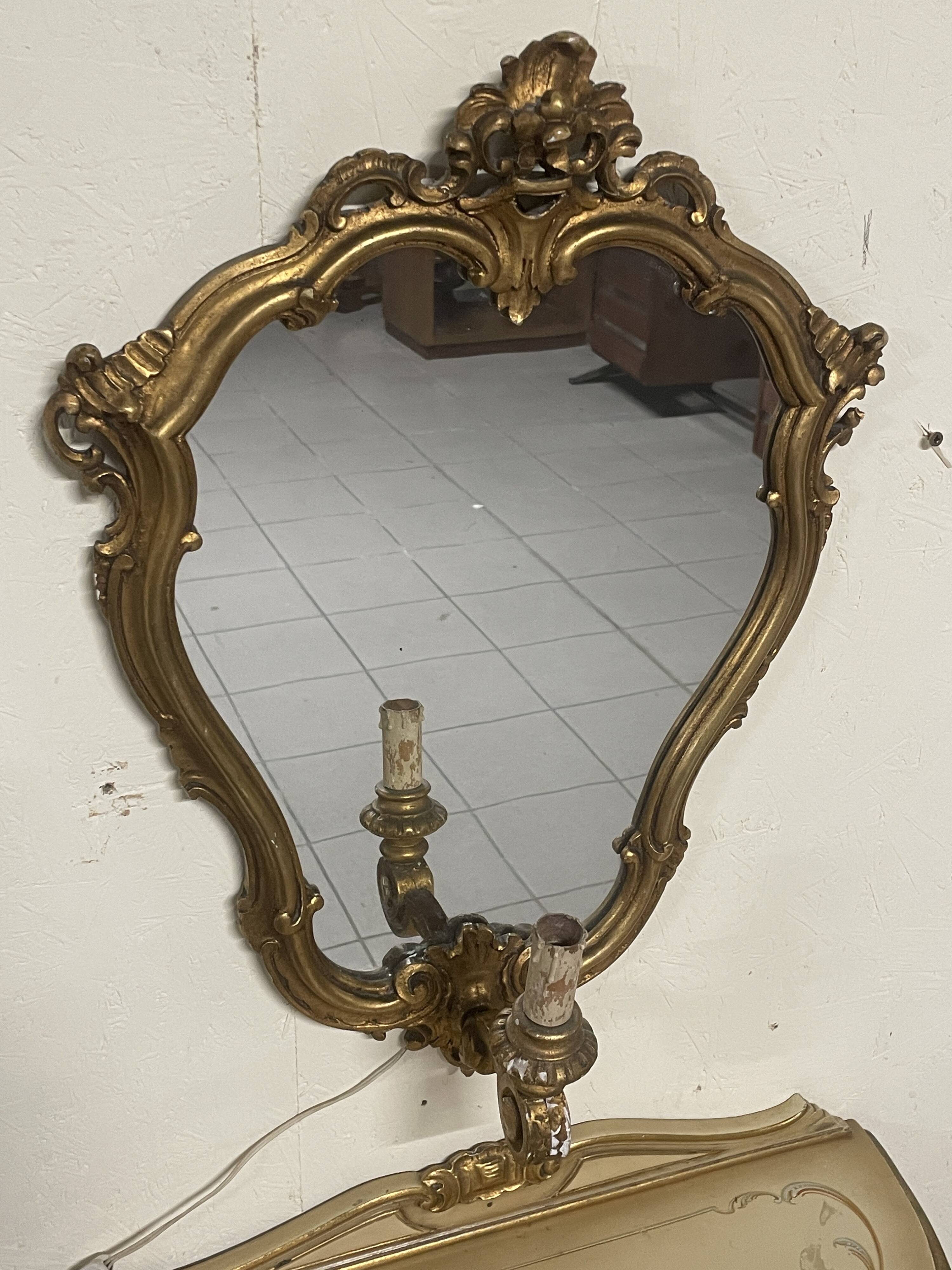 Pair of wall-mounted consoles with a mirror in Louis XV style.