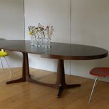 Extendable oval elm table with Baumann extensions