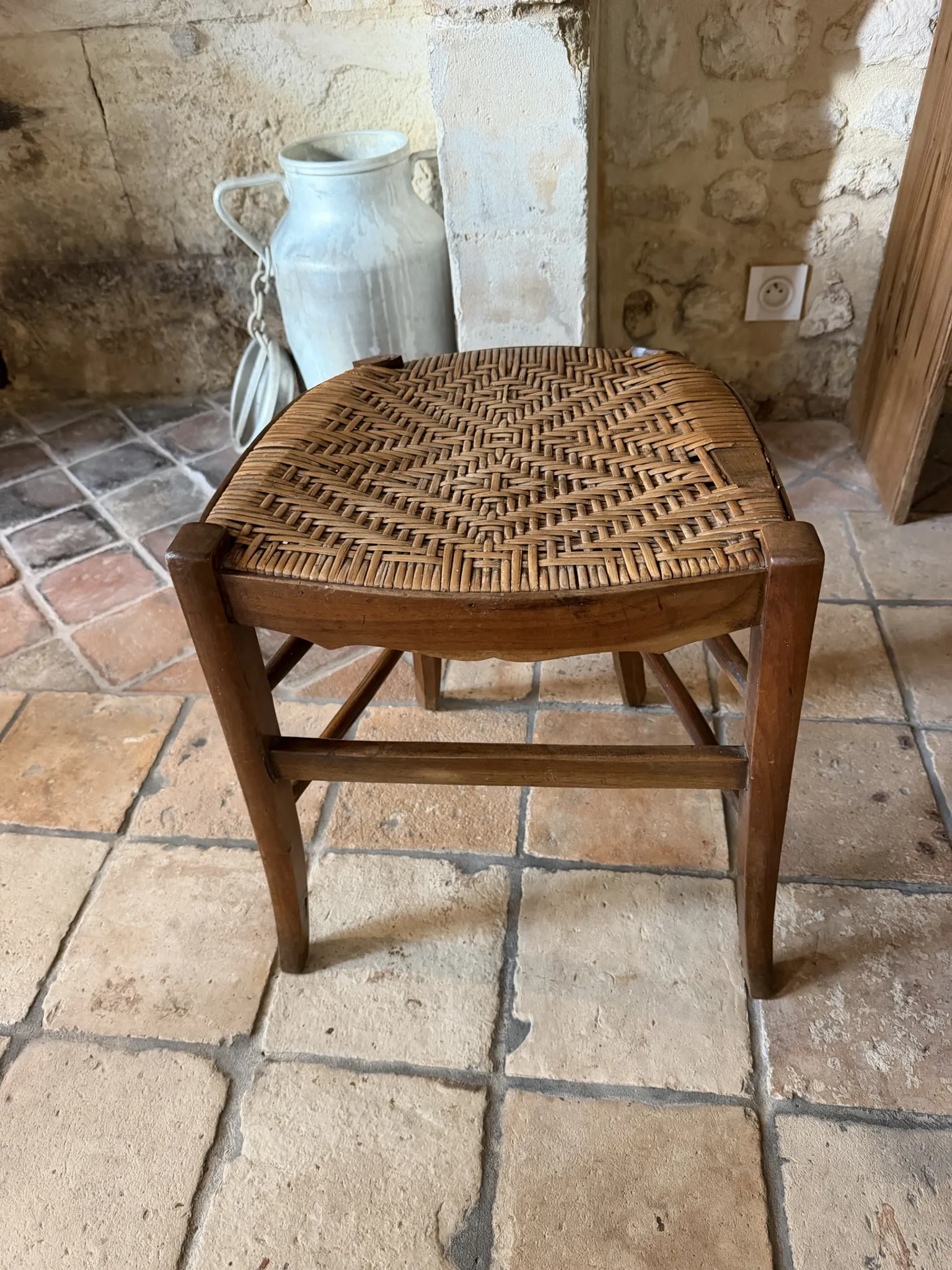 Campaign stool in rattan and wood