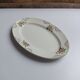 Oval plate Sarreguemines cream with pink gilding, antique.