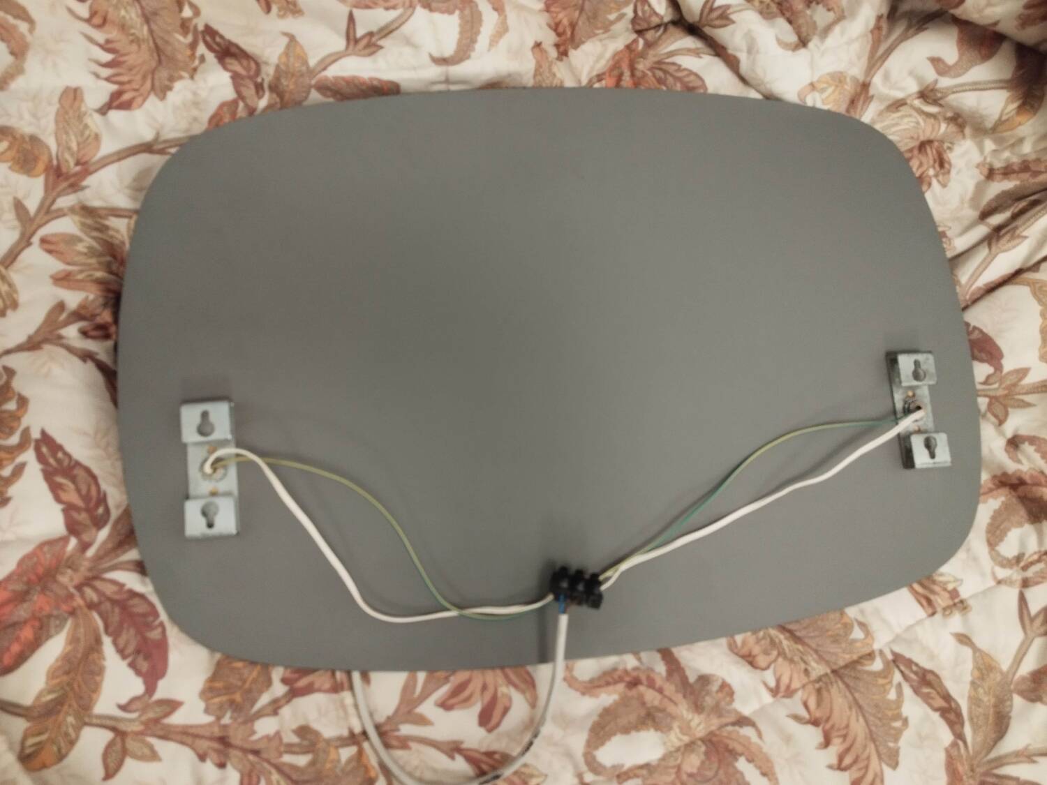 Miroir avec deux appliques en verre fumé attribué à Lupi