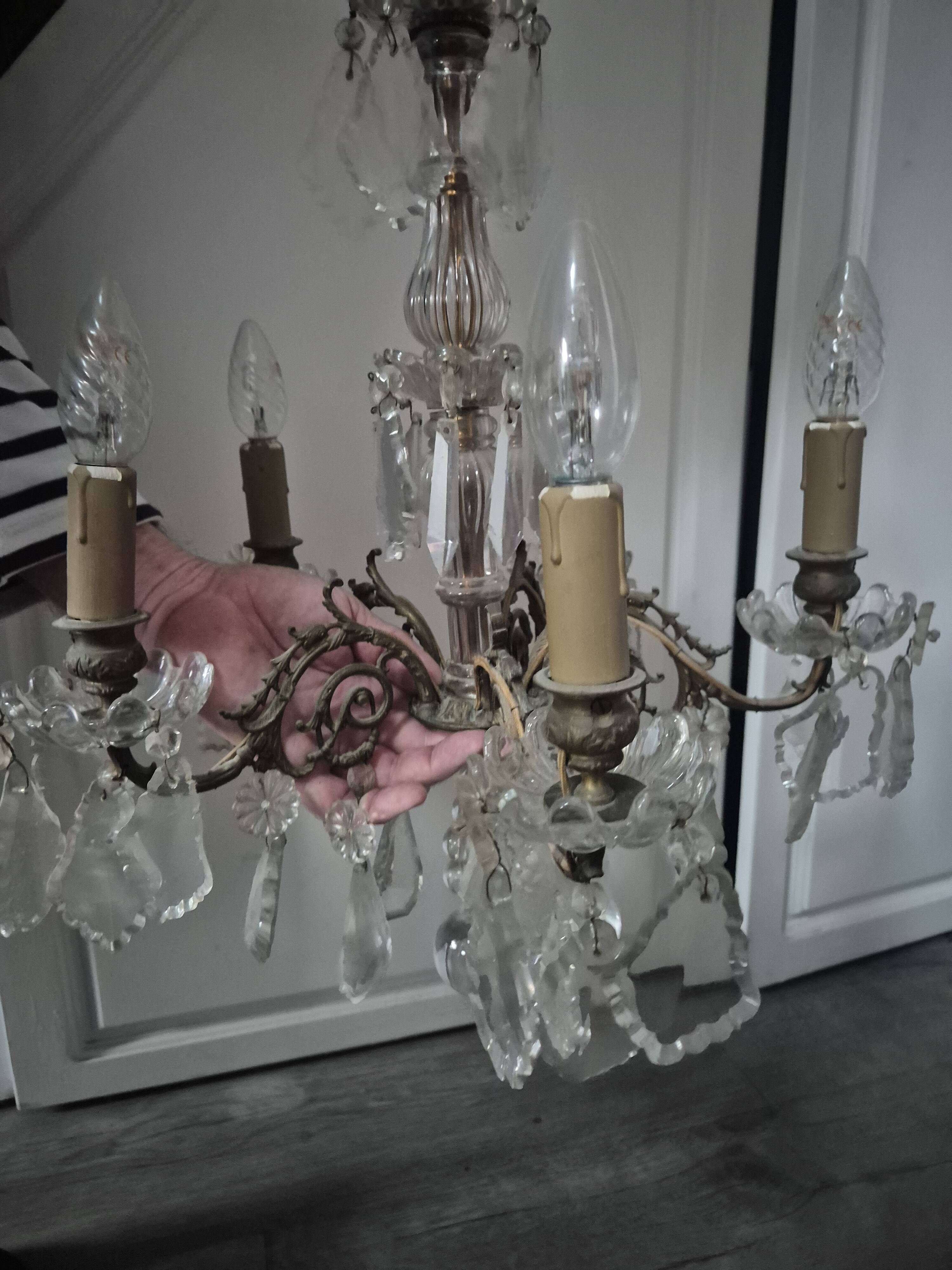 vintage pendant light from the 60s 70s with glass pendants and 5 candle holders