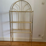 Gilded metal grid shelf in the shape of a vaulted arch