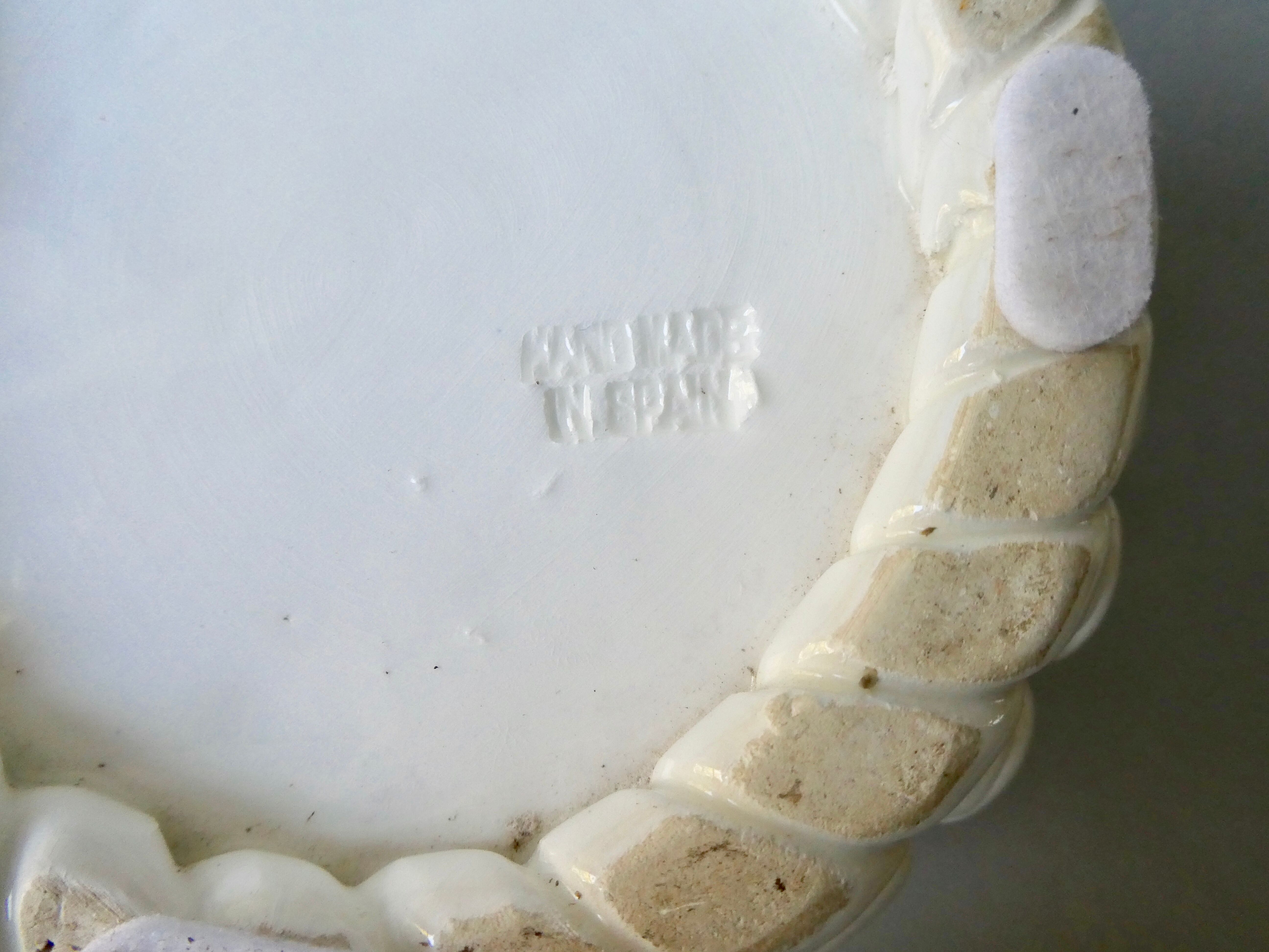 Openwork and braided ceramic pot cover