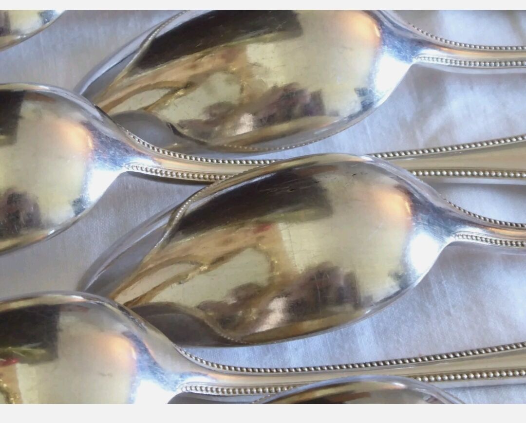 12 tablespoons Christofle