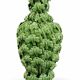 Green vase from Manises with leaf decoration.