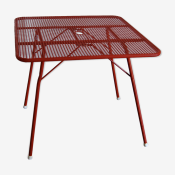 Table pliante en métal rouge type Malaval