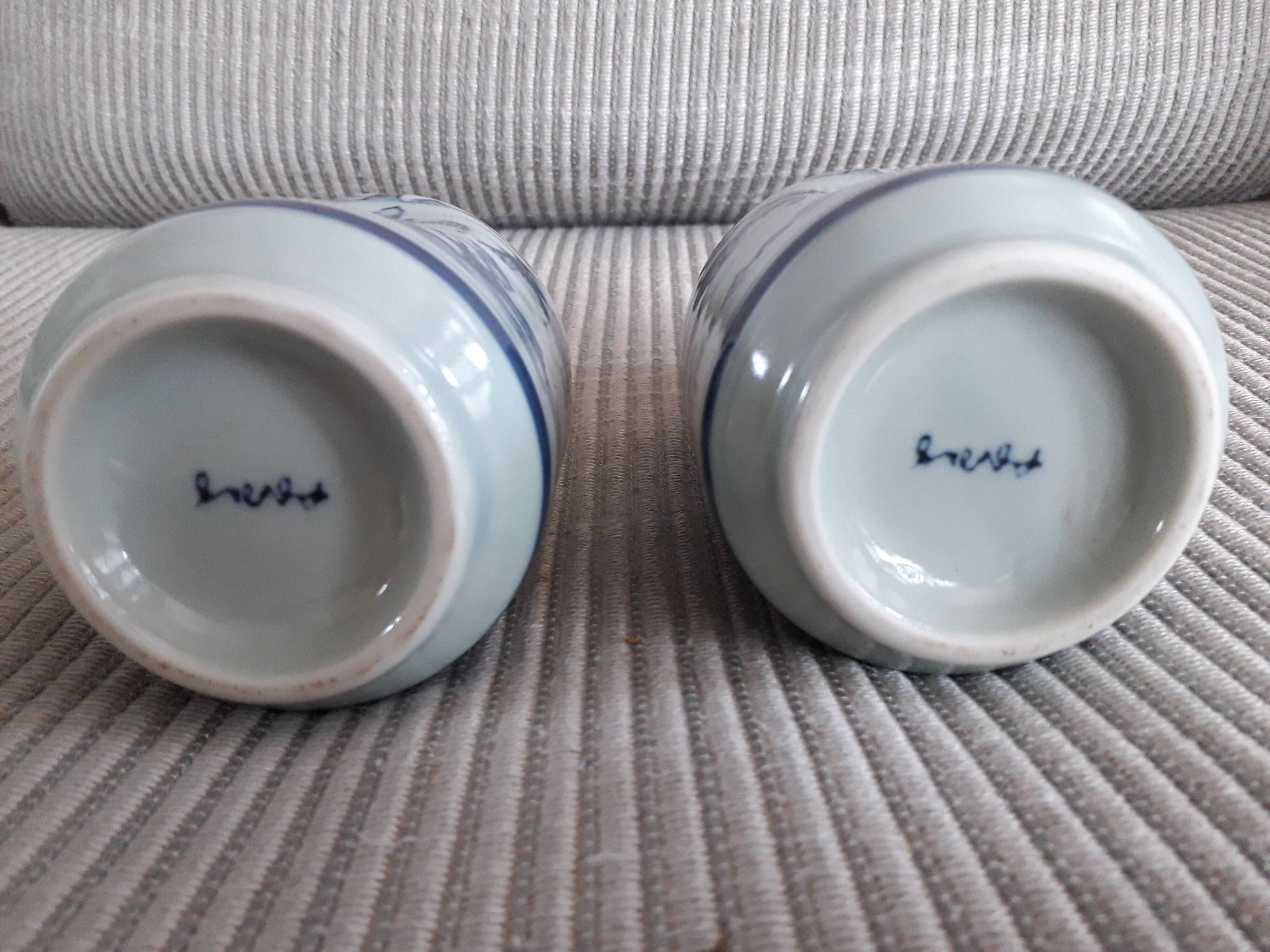A pair of vintage Chinese ceramic vases signed