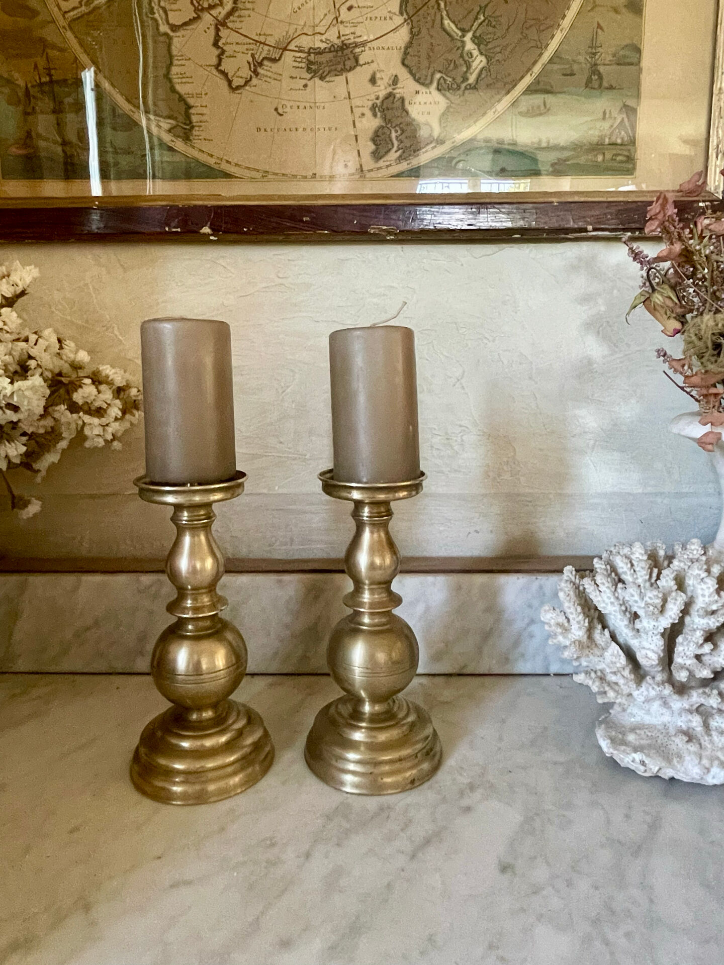 Pair of solid brass candlesticks from the 19th century.