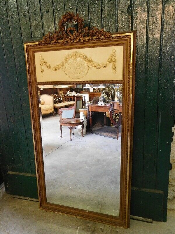 Louis XVI overmantel mirror with cherubs from the XIXth century