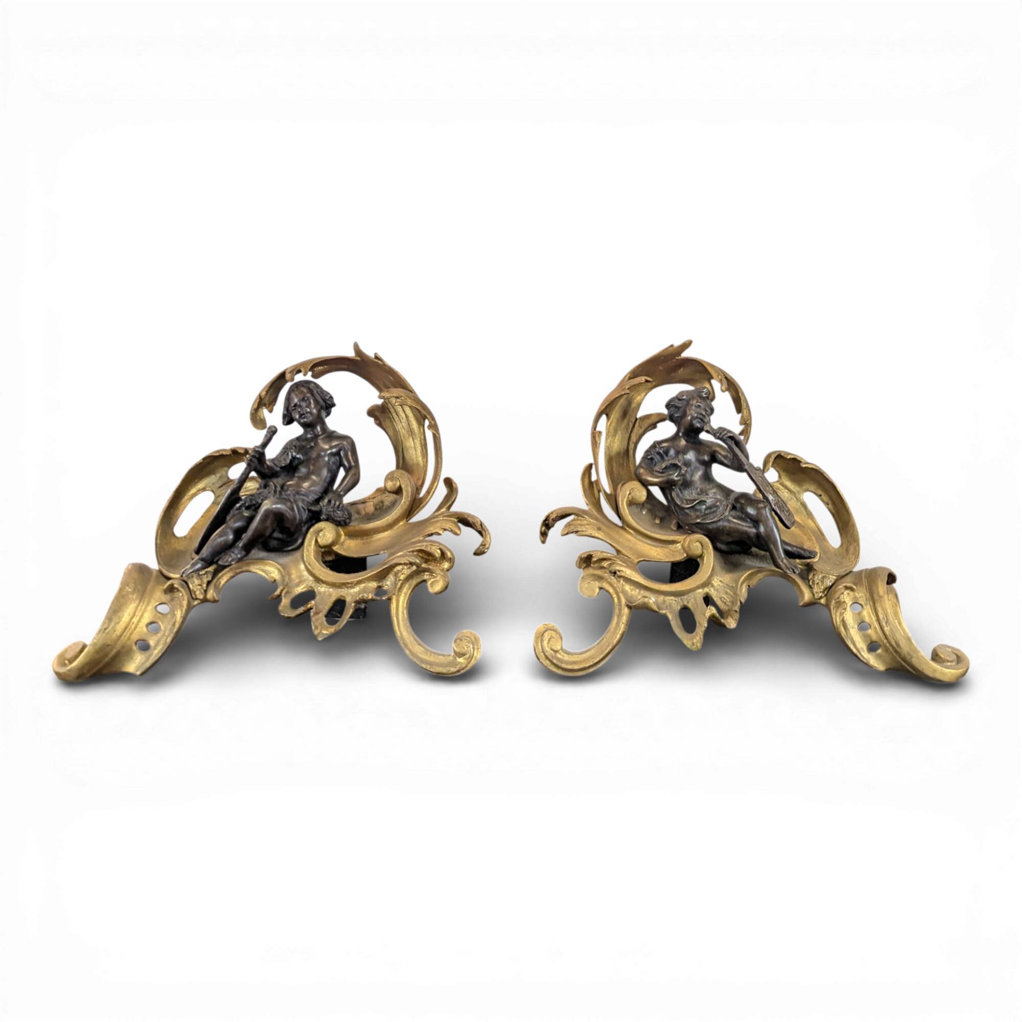 Pair of bronze fire dogs in the Louis XV style