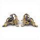 Pair of bronze fire dogs in the Louis XV style