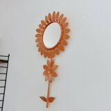 Large 1970s "flower" mirror in orange metal