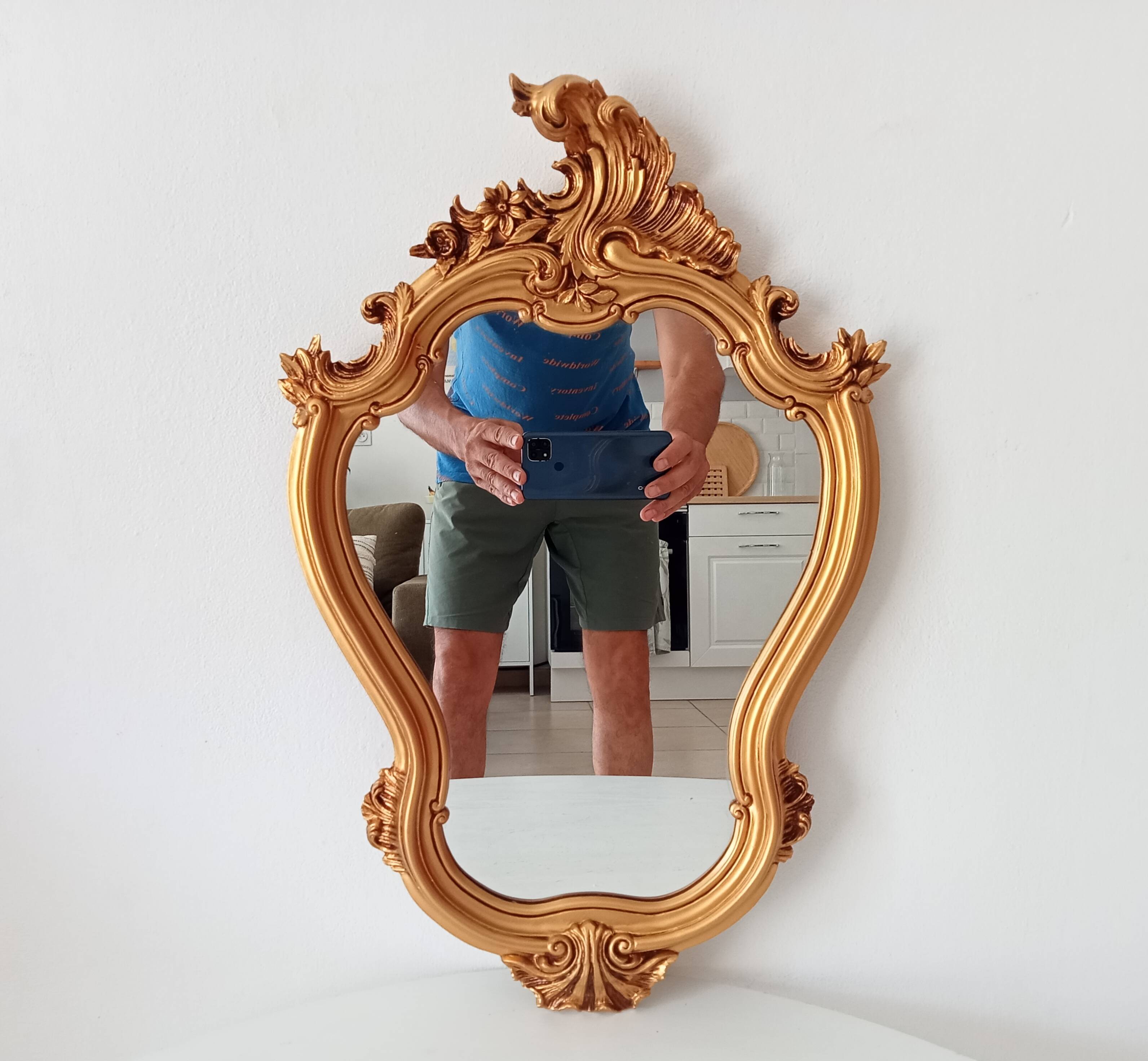 Vintage rococo mirror in gilded resin