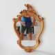Vintage rococo mirror in gilded resin