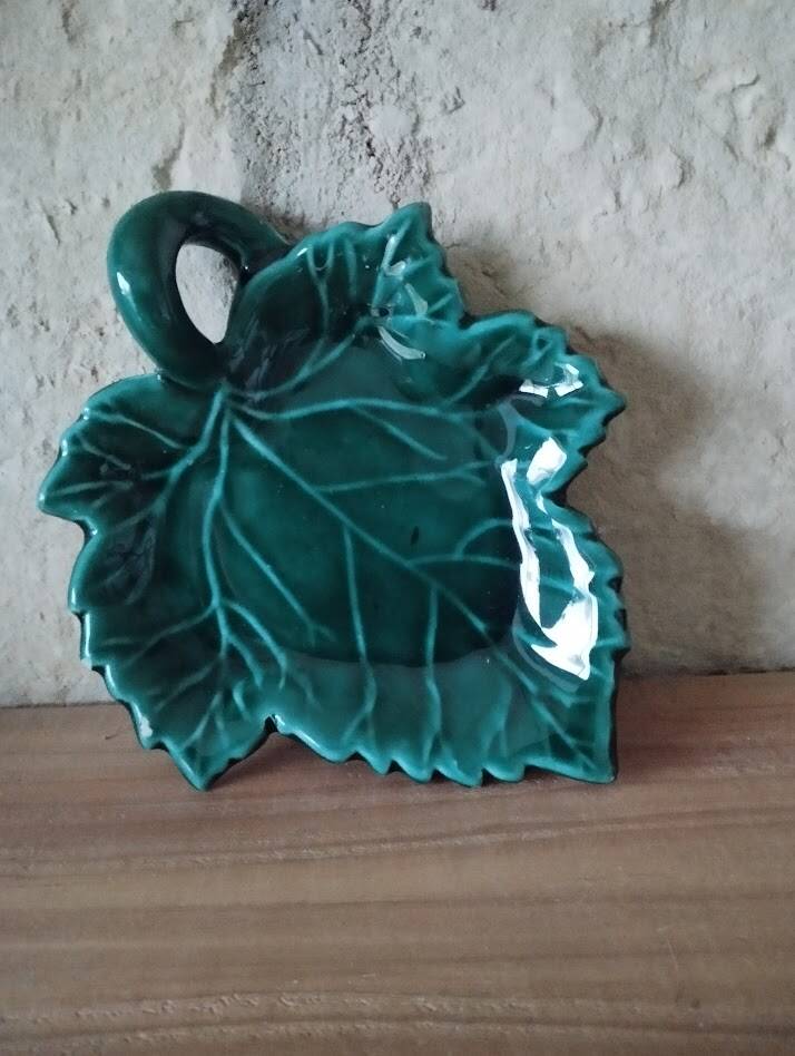 Charming ceramic dish in the shape of a leaf, signed Vallauris, in