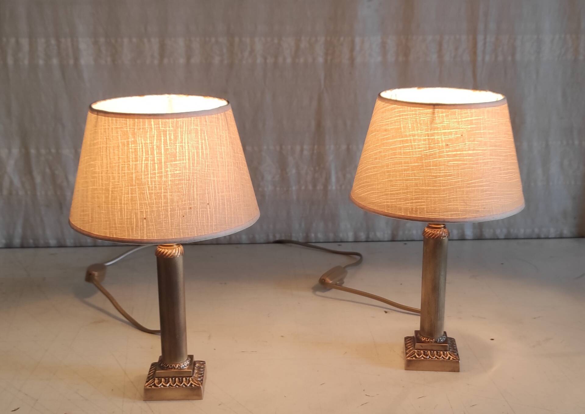 Table lamps in gilded brass with paper shades - mid 20th century.