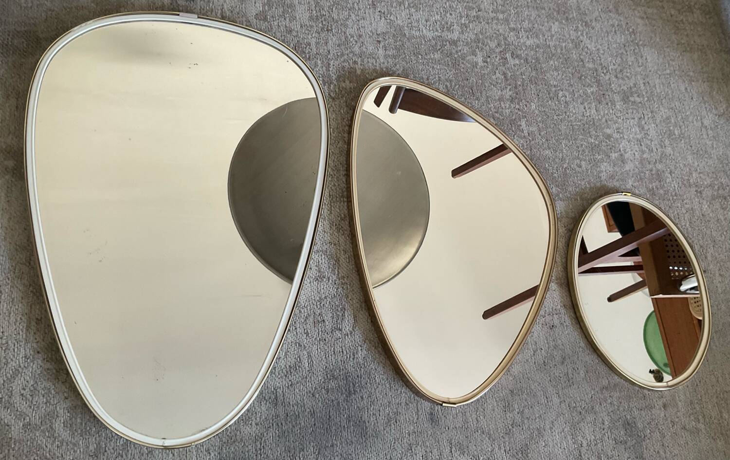 Trio of asymmetrical free-form mirrors from the 60s and 70s