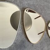 Trio of asymmetrical free-form mirrors from the 60s and 70s