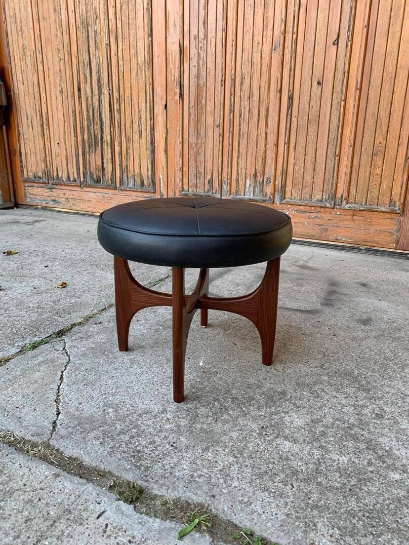 Mid-Century teak and black leather ottoman stool by Kofod Larsen for G-Plan, 1960s