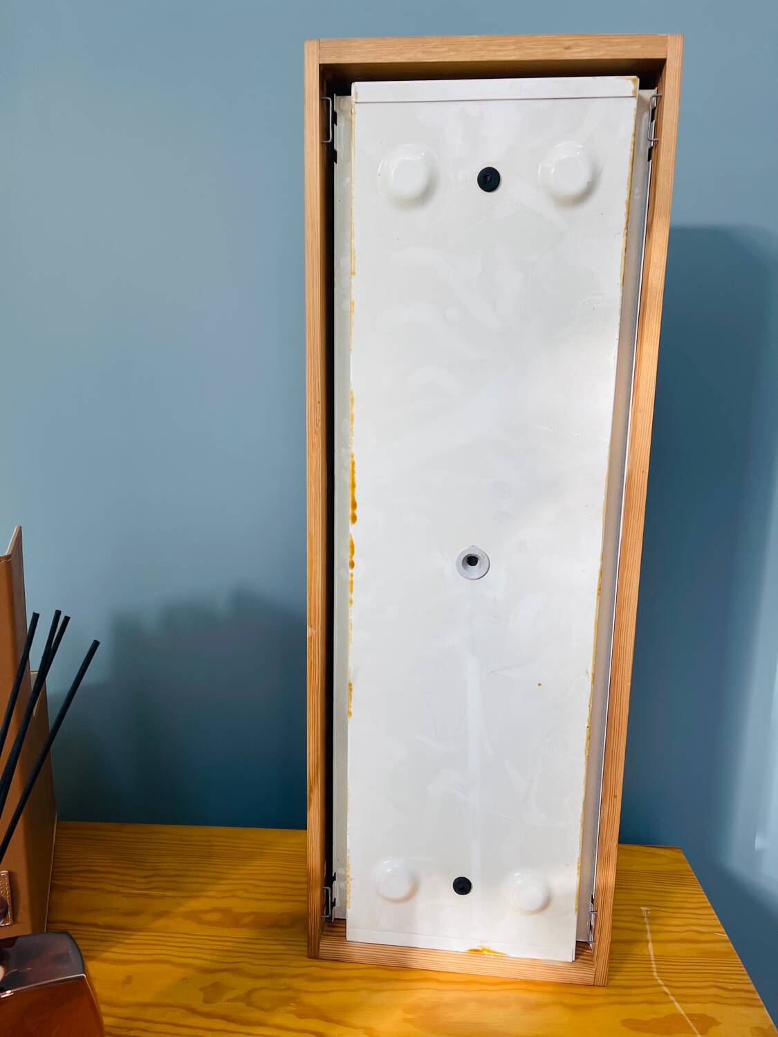 Scandinavian ceiling light in teak, circa 1970.
