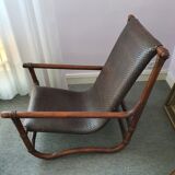Rattan and leather rest chair