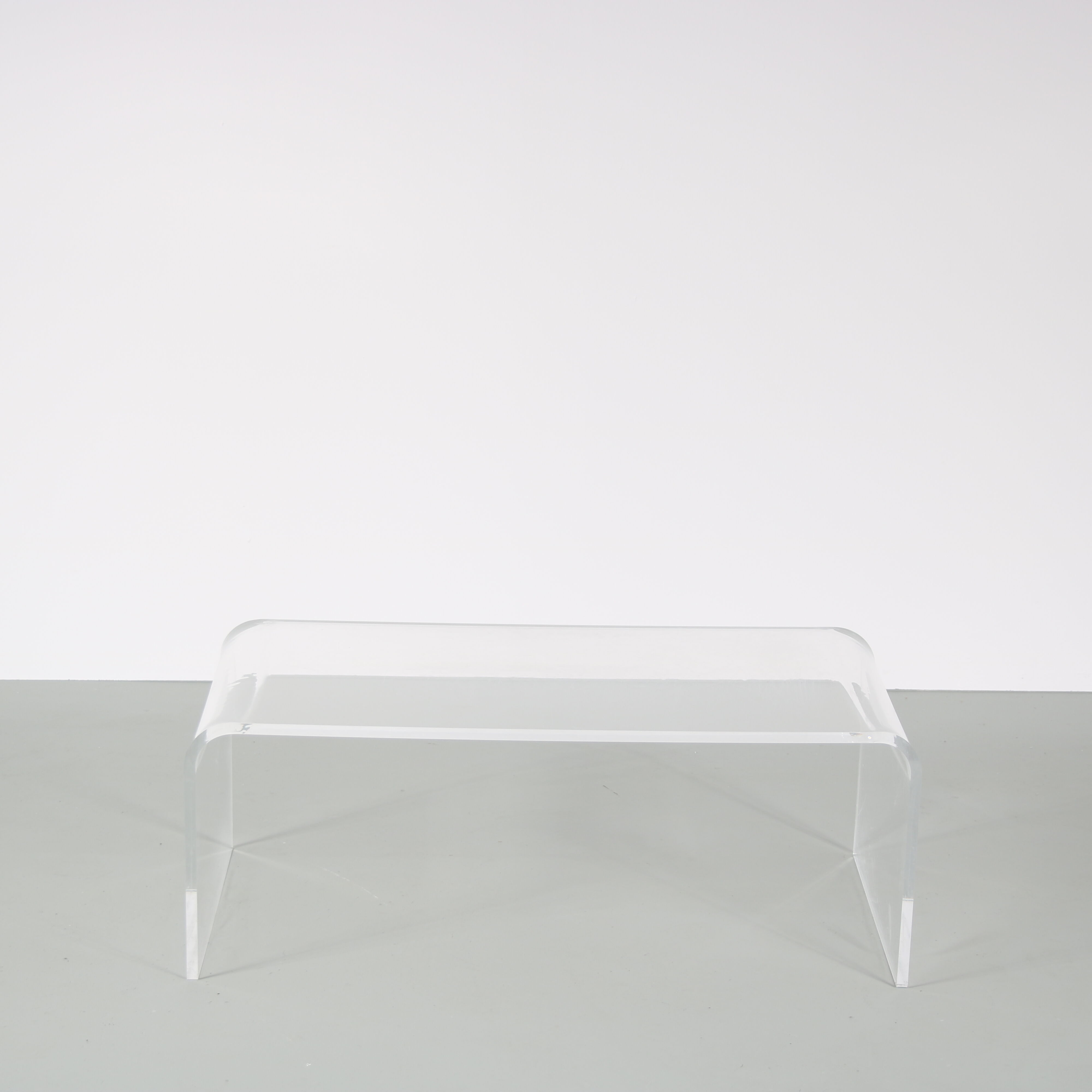 1970s Bent plexiglass coffee table from France