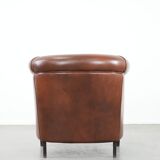 Cognac-coloured cow leather club armchair in English style