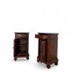 A pair of antique walnut bedside tables from the 1890s.