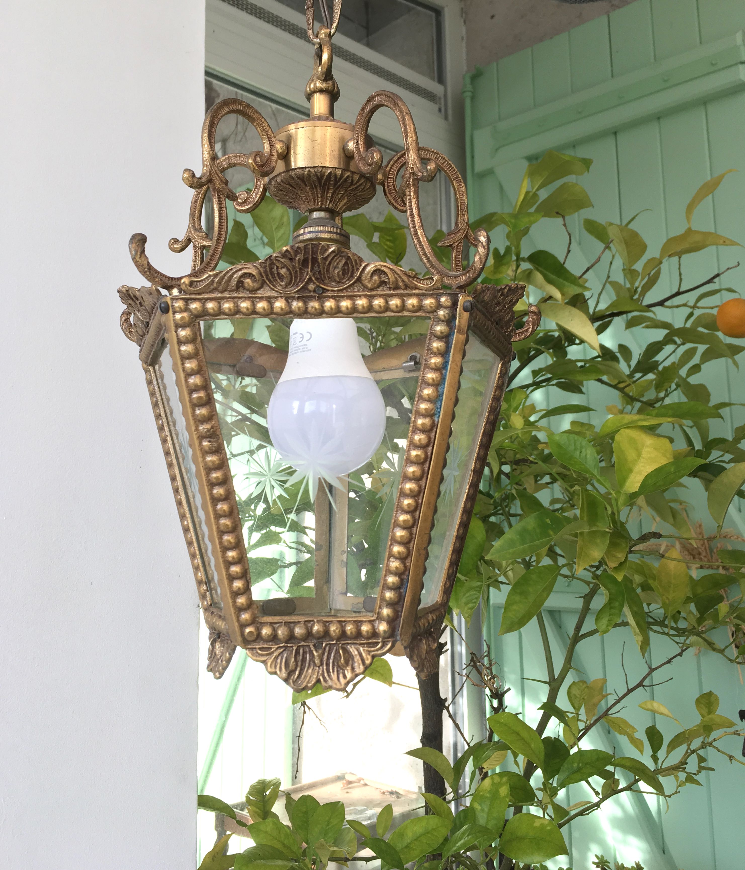 Hanging brass lantern and engraved glass