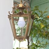 Hanging brass lantern and engraved glass