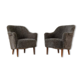 Fauteuils lounge Samspel en peau de mouton/schéarling modernistes de milieu du siècle par Carl Malmsten