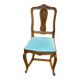 Vintage Louis XV chair made of carved solid wood with blue velvet fabric.