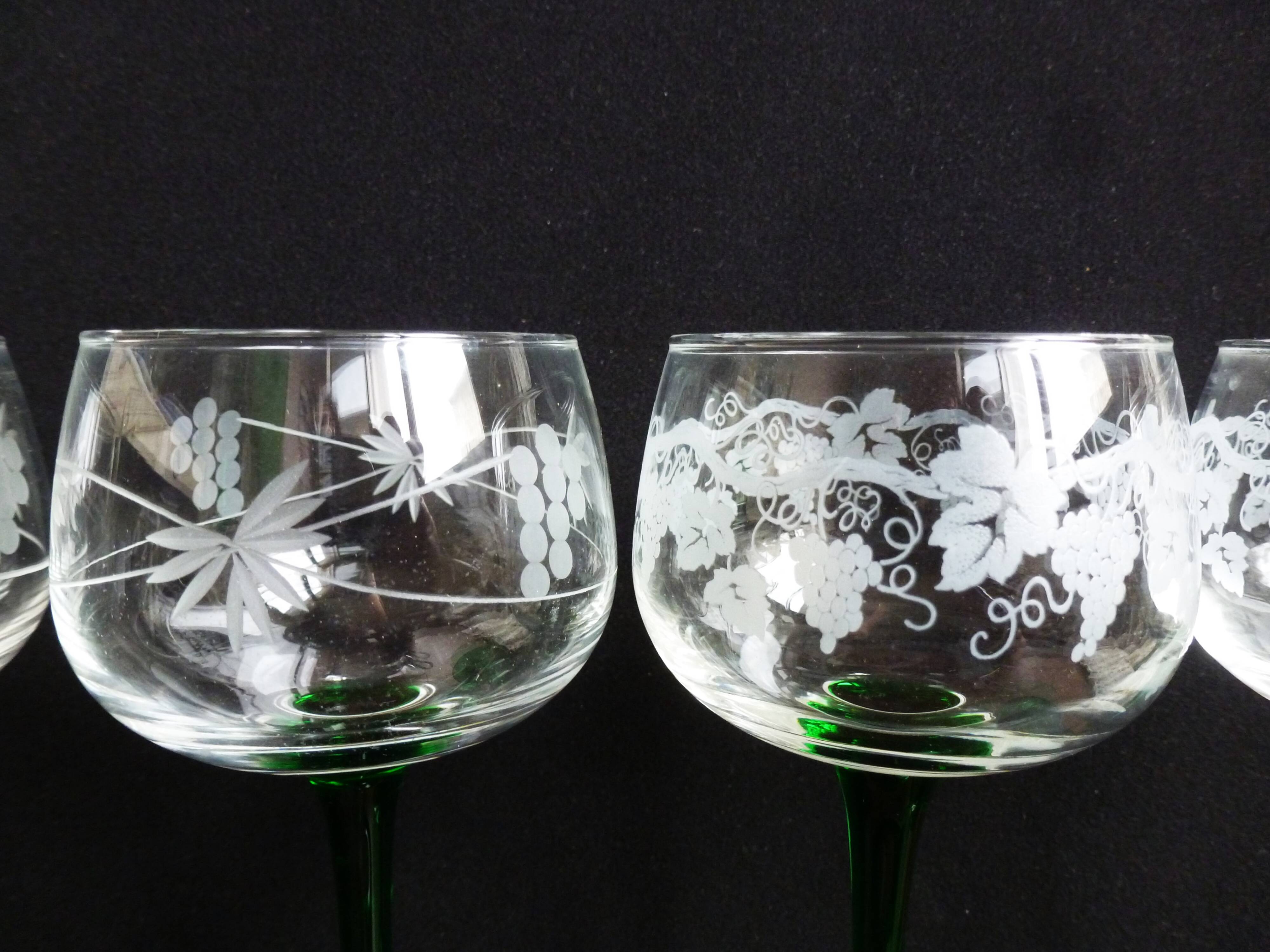 Alsace wine glasses, white wine glasses, green stemmed table glasses.