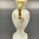 Small amphora vase in Limoges porcelain with gilded handles.