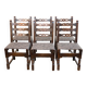 6 solid wood dining chairs with grey woven wool seats.