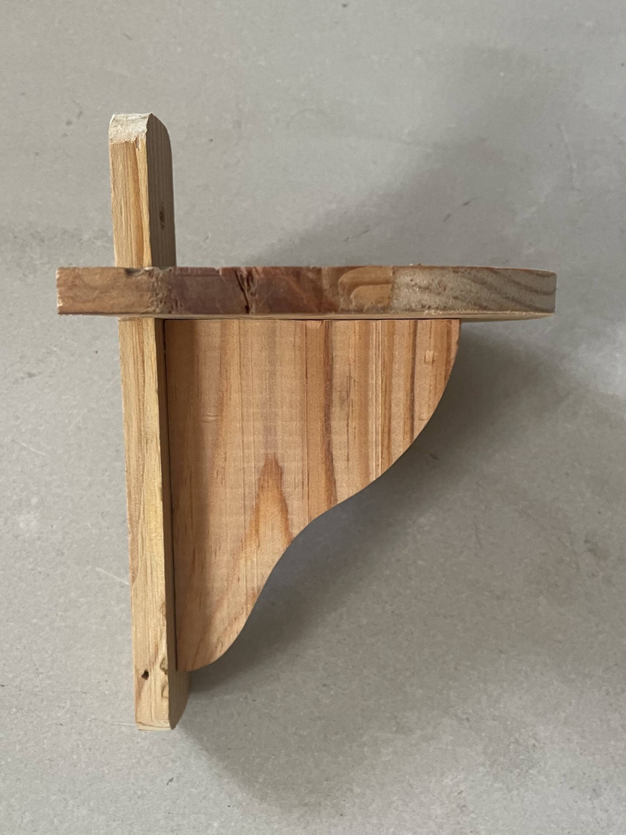 Small wooden wall shelf
