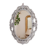 Louis XVI style patinated oval mirror