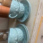 Set of 4 soup / consommé cups and saucers in ceramic.