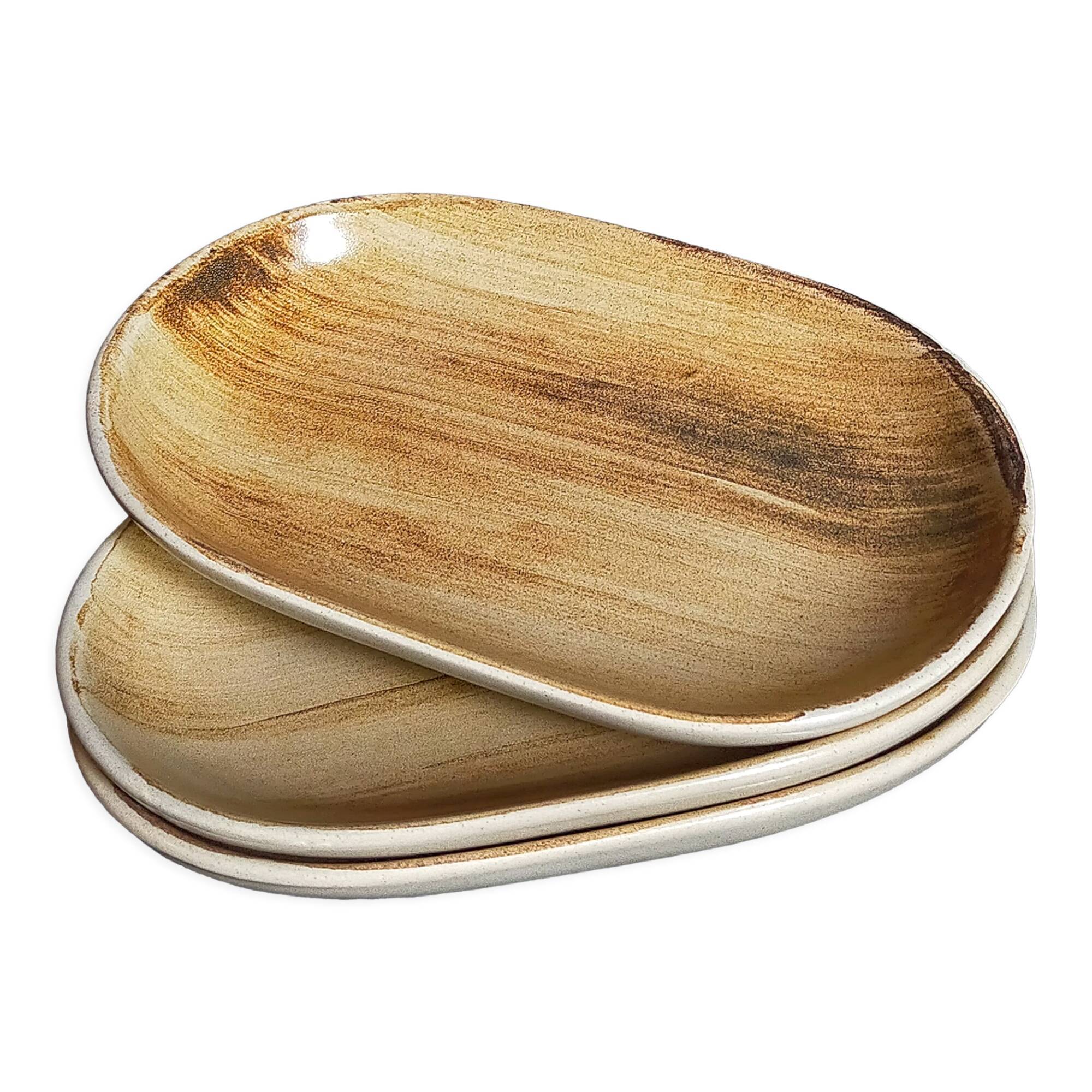 Three ceramic raviers decorated with vintage brushstrokes